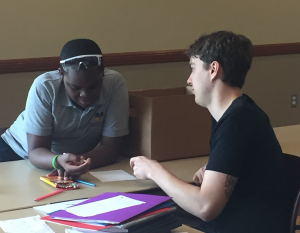 Roy and student at Kroc Center